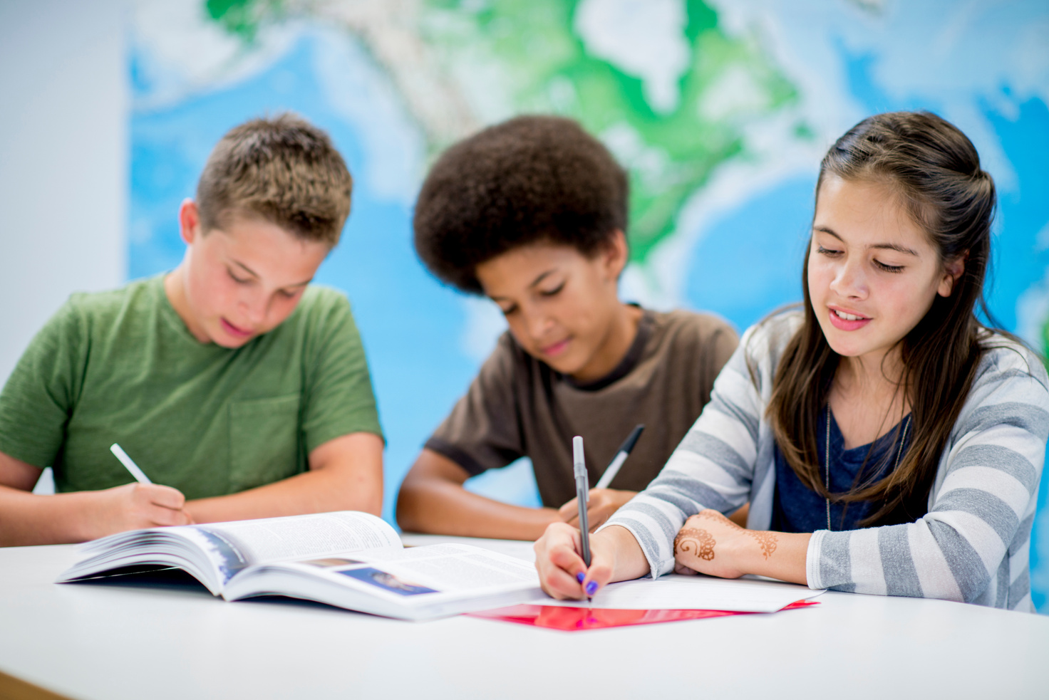 Elementary School Students Reading and Writing